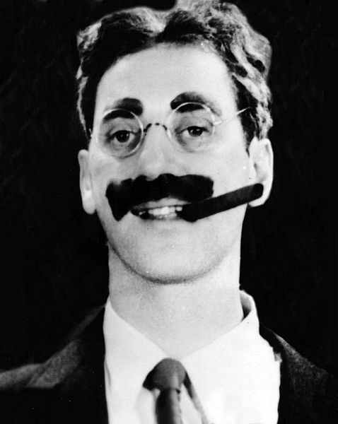 groucho marx with a cigar 